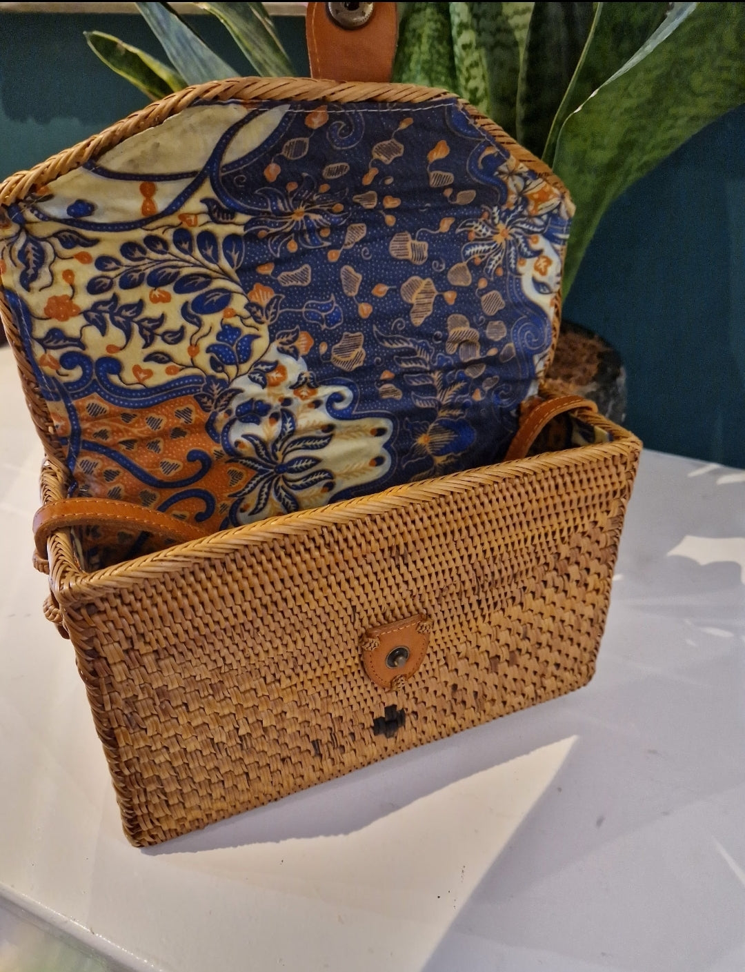 Rectangle Rattan bag with leather strap and leather buckle closure